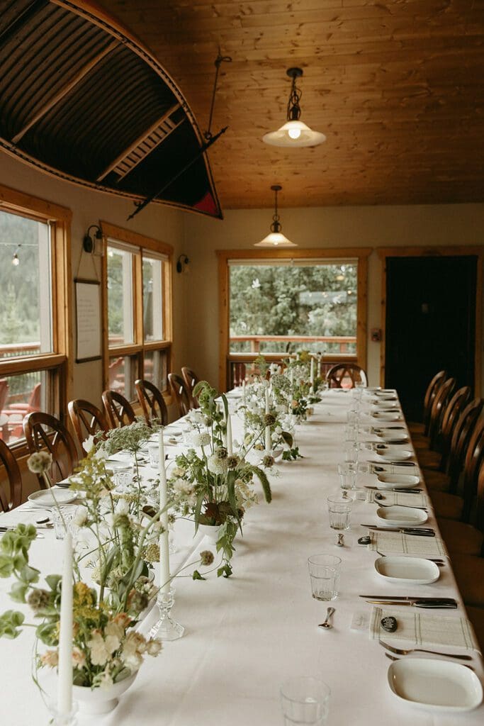 Full table setting for Miranda and Brian's Wedding Ceremony at Mount Engadine Lodge in Kananaskis, Alberta