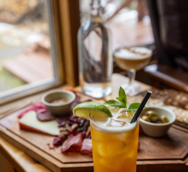 A refreshing cocktail and afternoon tea at Mount Engadine Lodge in Kananaskis, Alberta