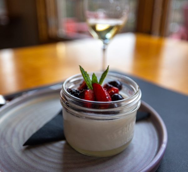 Vanilla mousse dessert course during Mount Engadine Lodge dinner service